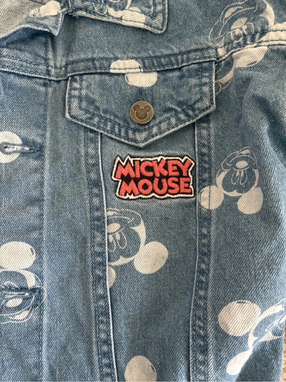 Disney Mickey Mouse blue denim trucker jacket with white Mickey Mouse Size 6
